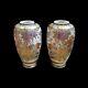 A Pair Of Meiji Period Satsuma Vases Painted With Peacocks, Wisteria And Flowers