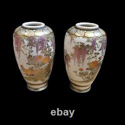 A Pair Of Meiji Period Satsuma Vases Painted With Peacocks, Wisteria And Flowers