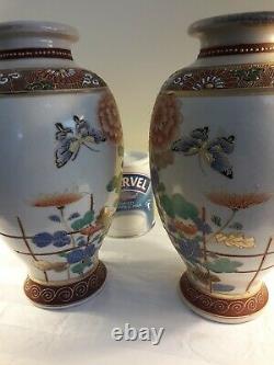 A pair of Japanese satsuma pottery vases meji period vases hand painted signed