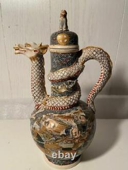 Antique Japanese Satsuma Kyoto ware wine pot with a Dragon design marks on base